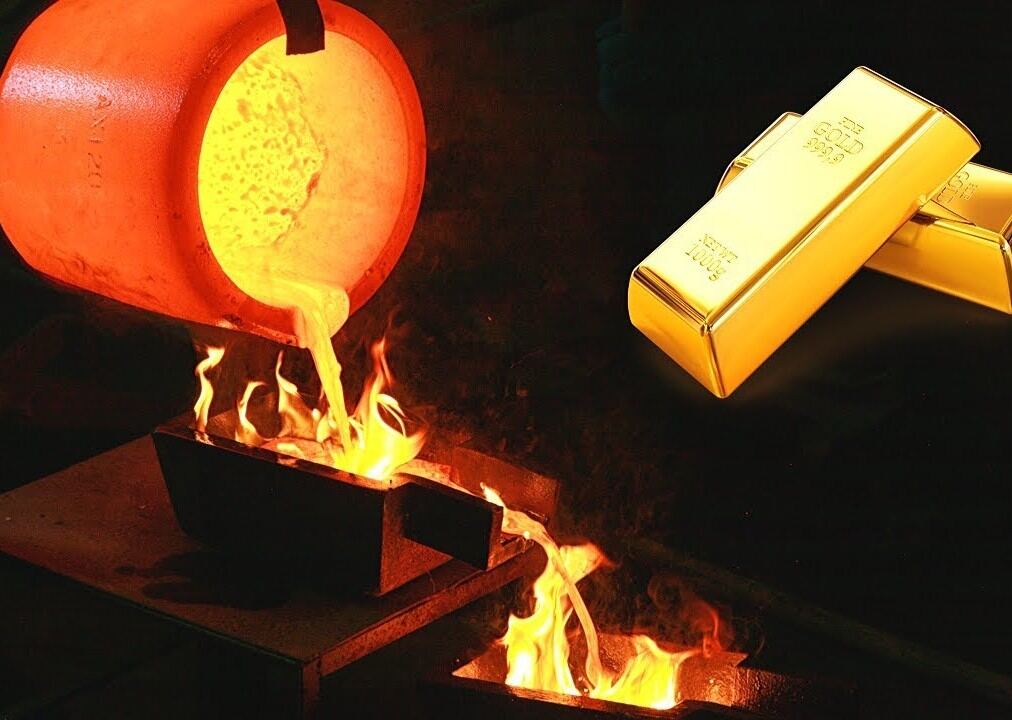 Molten 24k gold being poured into a bespoke mould